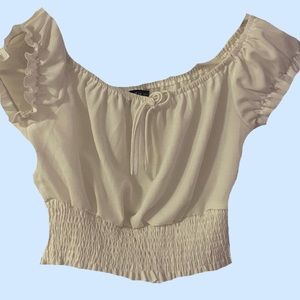 Trendy white ruffled top!